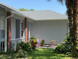 A Florida home with white gutters